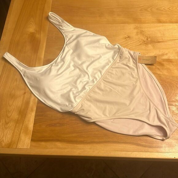 NWT CREMIEUX one piece with long side v - Picture 1 of 7